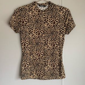 Leopard mock neck cap sleeve top